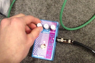 Knuckle Guitar Works sub-contra bass played through Malekko Diabolik fuzz @ NAMM 2014